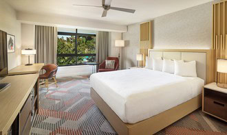 Luxurious hotel room at Scheid Vineyards with modern decor and scenic views.