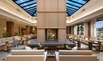 Luxurious indoor lounge at Scheid Vineyards with modern design and elegant seating.